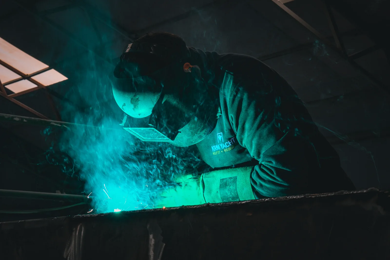 KRM YACHT WELDER WORKING ON STEEL STRUCTURE INSIDE A YACHT UNDER REFIT