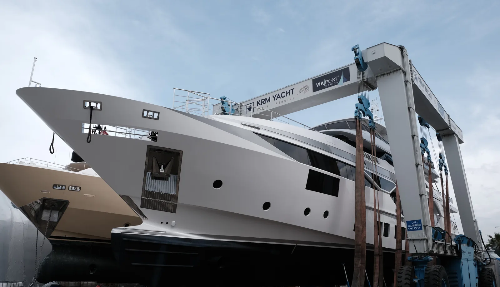 LARGE WHITE SUPERYACHT HAULED OUT IN THE KRM YACHT TRAVEL LIFT AT THE TUZLA YARD